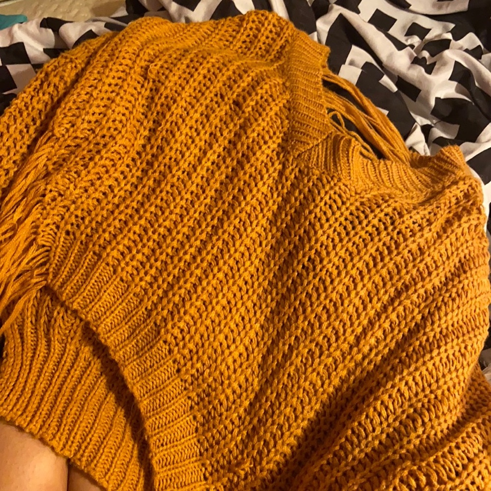 It’s a sweater you can put a tank top under
